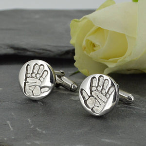 Two disc shaped cufflinks in solid silver with two children's handprints | Adjustable Cufflink backs | Custom Personalised Gift | Sophia Alexander Fingerprint Jewellery | Handmade in Suffolk UK