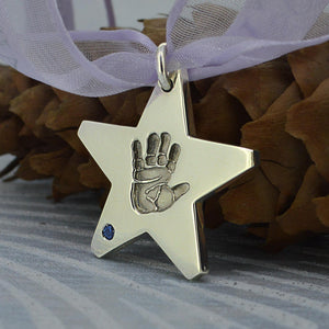 Large star shaped baby Handprint Necklace in solid silver | Blue Sapphire gemstone - birthstone for September | Personalised Necklace | Sophia Alexander Fingerprint Jewellery | Handmade in Suffolk UK