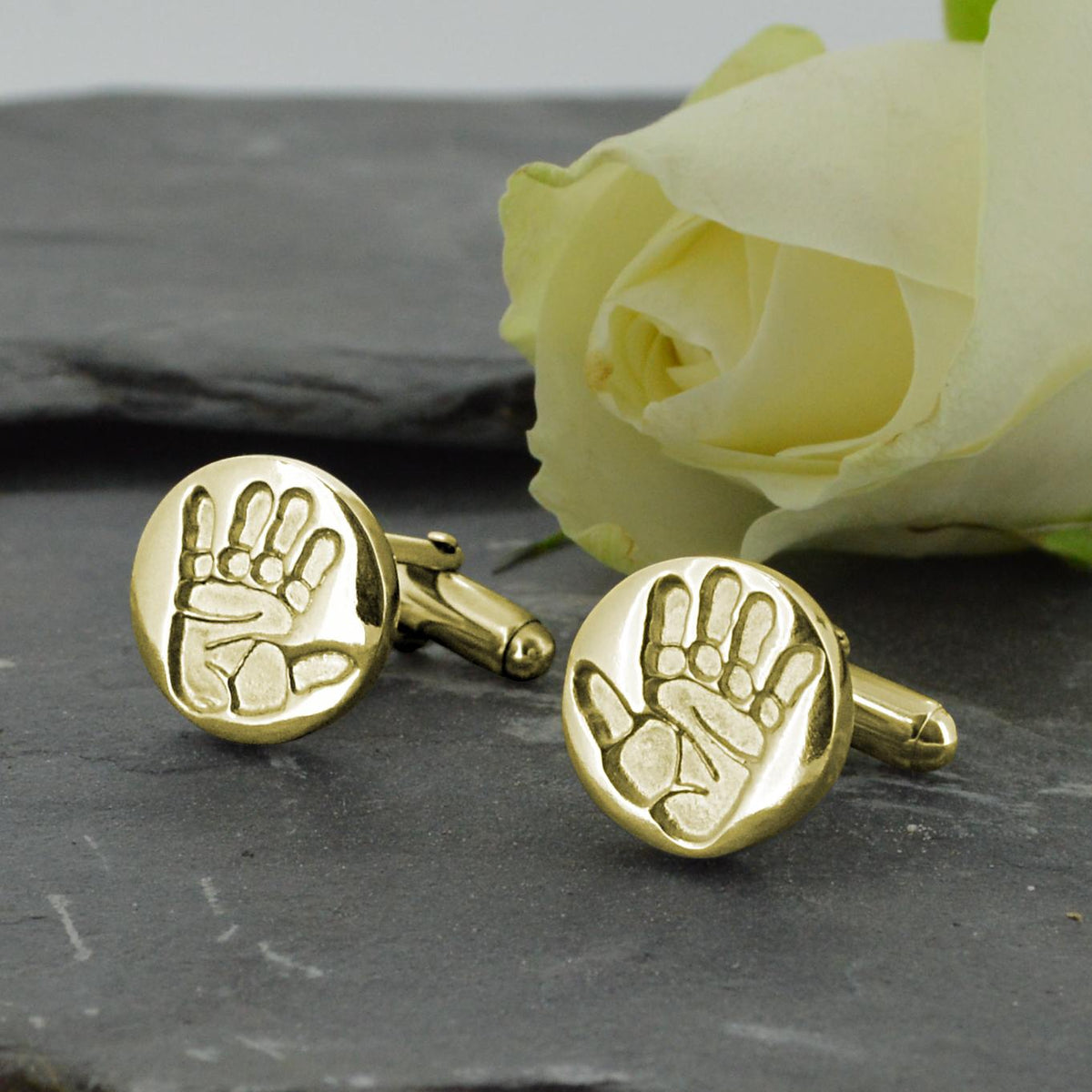Two disc shaped cufflinks in solid gold with two children's handprints | Adjustable Cufflink backs | Custom Personalised Gift  | Sophia Alexander Fingerprint Jewellery | Handmade in Suffolk UK