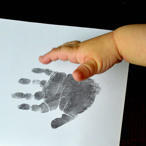Take the perfect baby handprint for your gold handprint charm | Charm Bracelets | Sophia Alexander Fingerprint Jewellery | Handmade in Suffolk UK