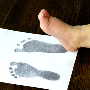 Take the perfect baby footprint for your gold footprint charm | Charm Bracelets | Sophia Alexander Fingerprint Jewellery | Handmade in Suffolk UK