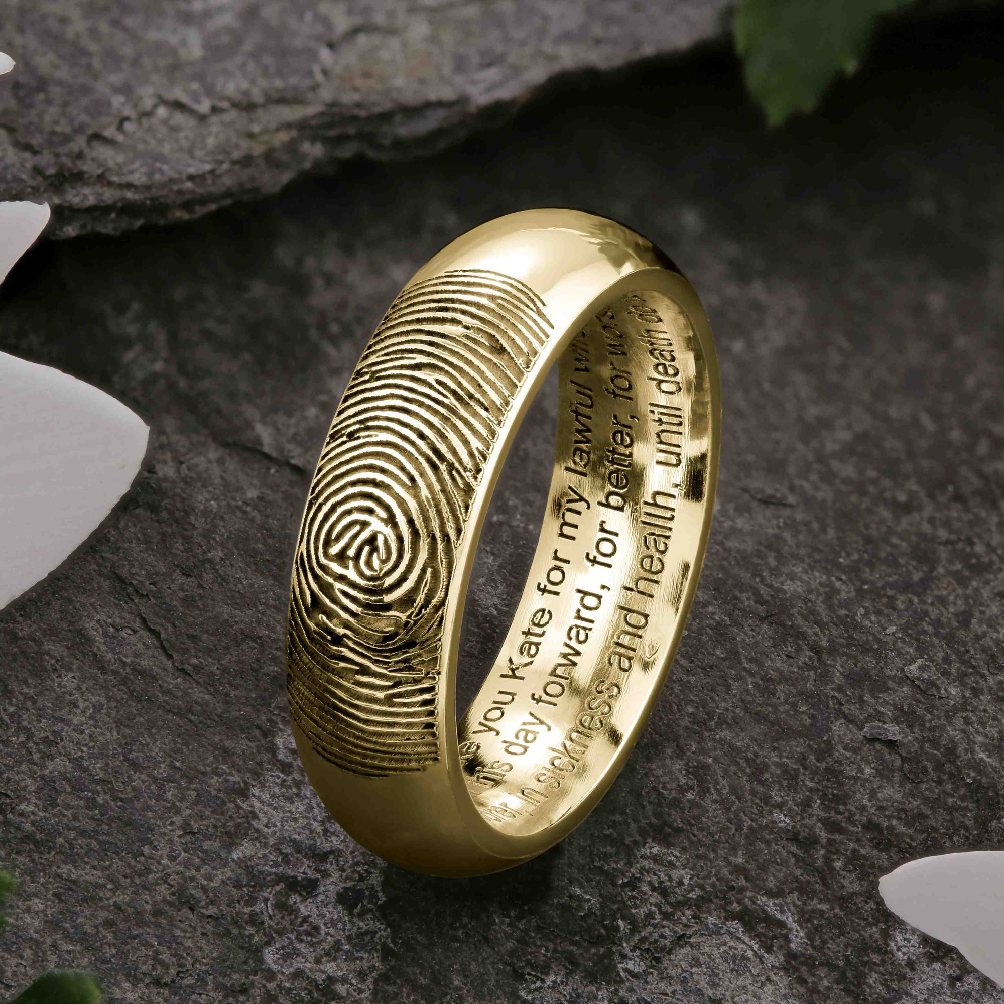 A unique Gold Wedding Ring with an engraved fingerprint on the outer surface | Engraved with personalised wedding vows on three lines on the inside of the ring | Contemporary Laser engraving | Mens 6mm wide, comfort court profile ring | Custom personalised wedding jewellery | Sophia Alexander Fingerprint Jewellery | Handmade in Suffolk UK