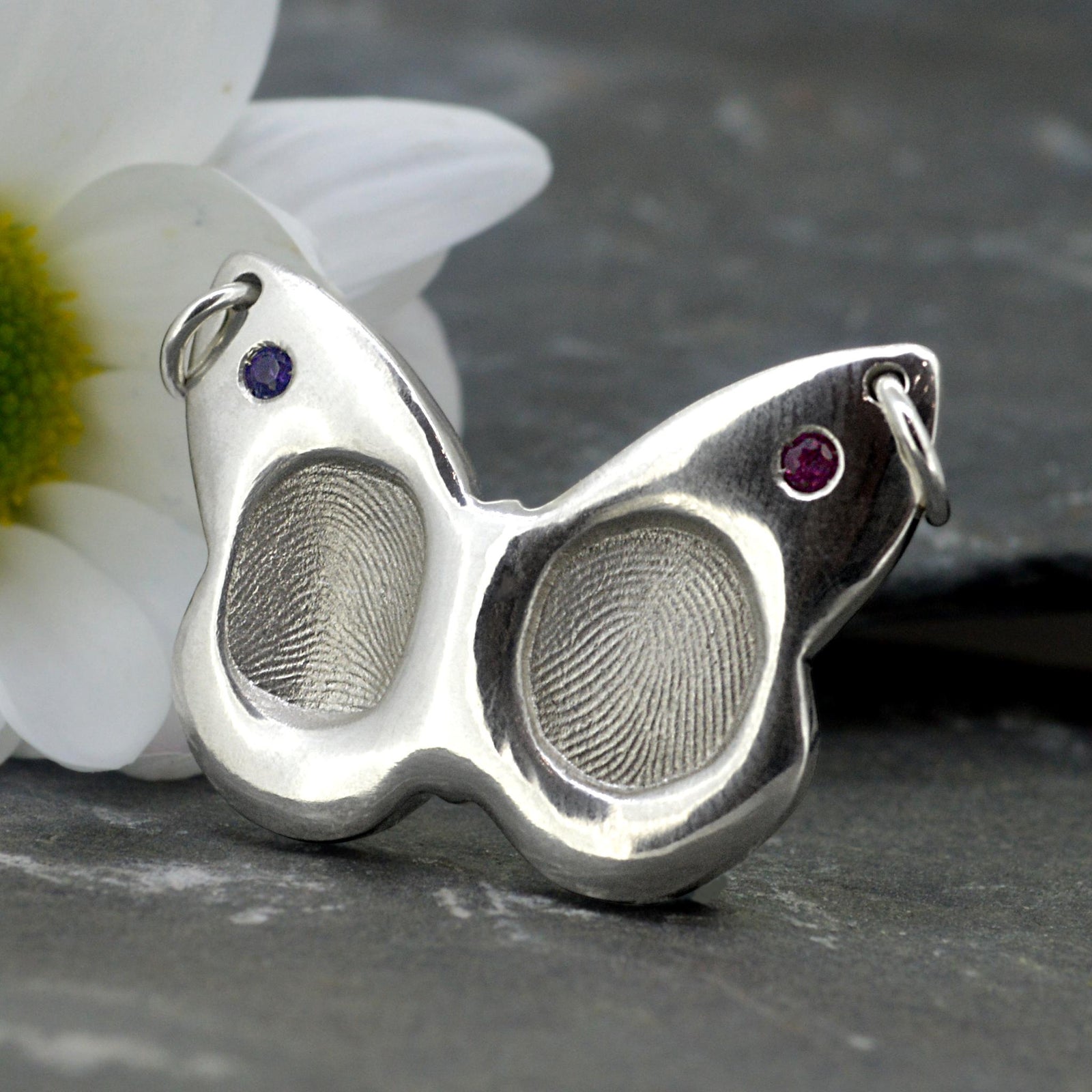 Butterfly style pendant in white gold with two children's fingerprints | Set with Sapphire and Pink Tourmaline gemstones | Birthstones for September and October | Personalised Necklace | Sophia Alexander Fingerprint Jewellery | Handmade in Suffolk UK
