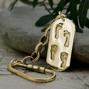 Large dog tag style pendant in solid gold with real baby Footprints | Shown on a Keyring with a chain | Personalised Necklace | Sophia Alexander Fingerprint Jewellery | Handmade in Suffolk UK